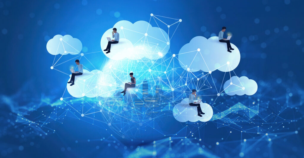 People working on laptops while sitting on clouds, connected by a digital network.