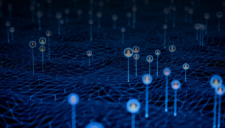 An abstract visualization of a data network, showing glowing profiles of people connected across a blue, grid-like digital landscape, representing a unified global file system.