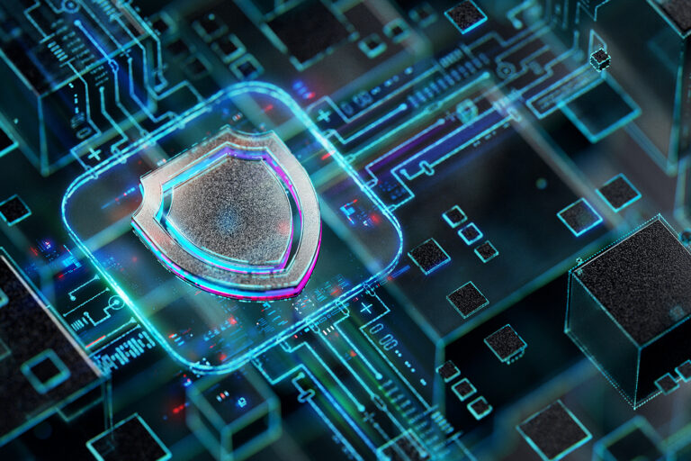 A glowing silver and blue security shield emblem is embedded directly onto a complex computer circuit board, illustrating the concept of integrated, hardware-level cybersecurity and data protection.
